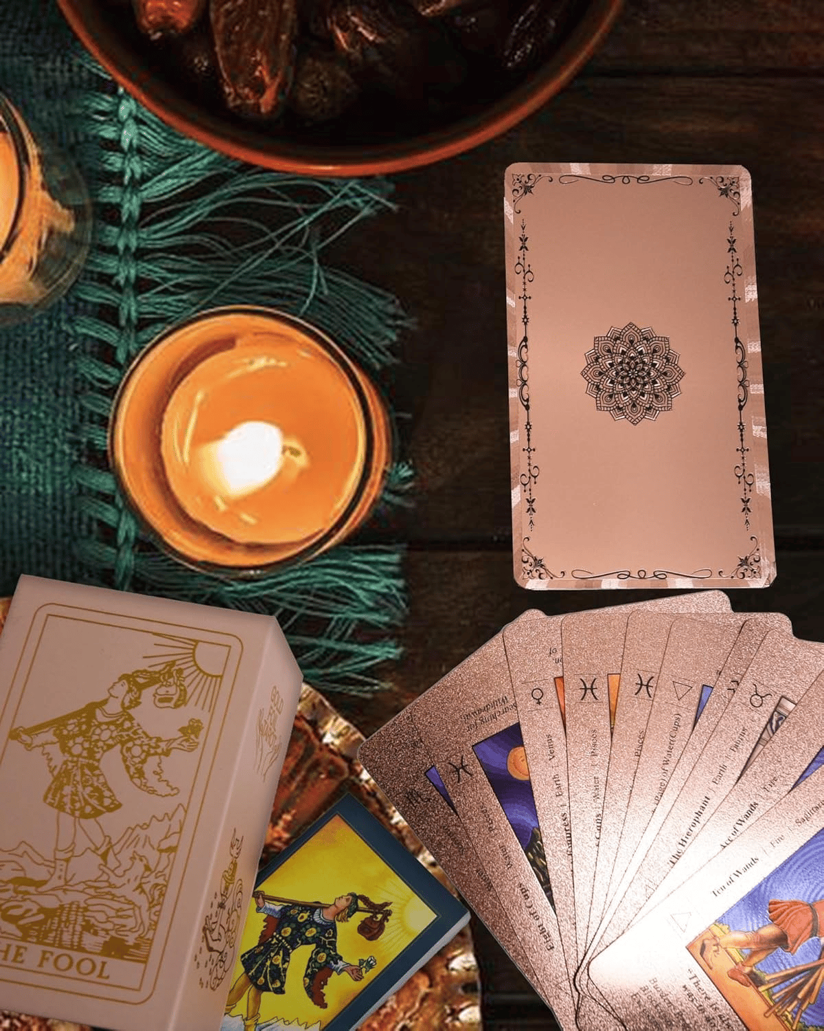 The Witch's Cauldron Rose Gold Tarot Card Set includes a guide booklet and is suitable for beginners. It features information on chakras, planets, zodiac signs, elements, and affirmations.